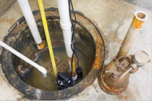 sump pump up close in house in }